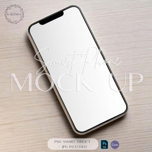 May include: A white smartphone mockup on a light wood background. The screen is blank and the phone is in a landscape orientation. The text "Smart Phone Mock Up" is visible at the bottom of the image.