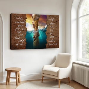May include: A framed canvas print depicting a helping hand emerging from water, with the text "He reached down from on high and took hold of me" and "He drew me out of deep waters - 2 Samuel 22:17". The artwork has a wood-grain border.
