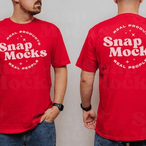 May include: Red t-shirt with a white circle graphic that says "REAL PRODUCTS Snap Mocks REAL PEOPLE" on the front and back.