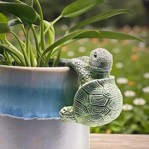 May include: A rustic wooden sign with the text "Welcome to our home" in white lettering. The sign features a distressed finish and a simple, inviting design, perfect for front door decor.