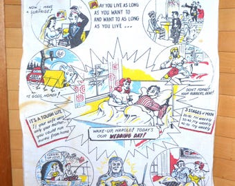 May include: A white tea towel with a cartoon illustration of a honeymoon couple. The towel has the text "Honeymooner's Towel" at the top and includes several humorous scenes of a couple on their honeymoon. The text "Honeymooners Breakfast" is at the bottom of the towel with the text "Tomato Juice - 2 Raw Eggs - Black Coffee - Aspirin and Our Sympathy..."