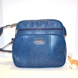 Vintage draagtas van echt blauw vinyl met sleutel