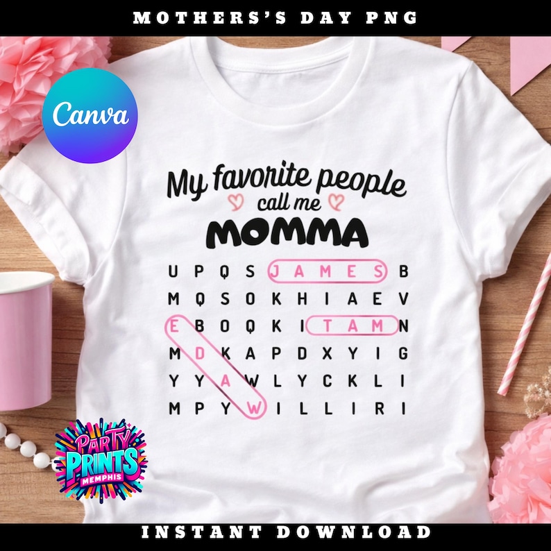 May include: White t-shirt with the text "My favorite people call me MOMMA" in black script. A word search puzzle highlights the names JAMES, EBOOK, and TAMN in pink. The shirt has a Canva logo and "Party Prints Memphis" logo.