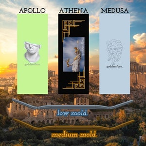 May include: Three different skateboard deck designs featuring Greek mythology figures. The designs are titled "Apollo", "Athena", and "Medusa". The designs are on a light green, black, and light blue background. The text "goddessfbco." appears on each design. The text "low mold." and "medium mold." appears below the designs.