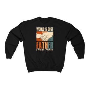 May include: Black sweatshirt with a retro-style graphic that says "World's Best Father I Mean Father" with a picture of two hands holding each other.