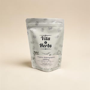 May include: A light grey pouch of Vita & Herbs Organic Andrographis 1000mg capsules. The pouch has a leaf pattern and the brand name in black. A white label displays product information.