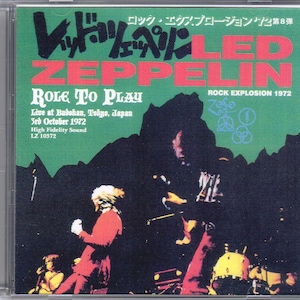 Op de afbeelding: Een vintage platenhoes van Led Zeppelin met de titel "Role To Play" en de tekst "Live at Budokan, Tokyo, Japan 3rd October 1972 High Fidelity Sound LZ 10372". De hoes is groen met een zwart-witfoto van de bandleden.