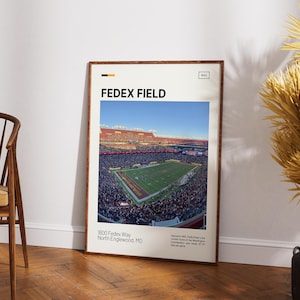May include: A framed poster featuring a high-angle photograph of FedEx Field stadium filled with spectators. The text reads FEDEX FIELD, 1600 Fedex Way, North Englewood, MD, and includes a brief description of the venue's history and capacity.