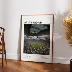 May include: A rectangular wall art print featuring a photograph of the interior of AT&T Stadium. The print includes the text AT&T STADIUM, One AT&T Way Arlington, TX, and a brief description of the venue, all set within a dark wood frame.