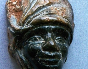 Sculpture in stone “African lady”