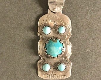 Sterling Silver pendant with 5 Turquoise stones