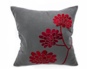 red and gray throw pillows