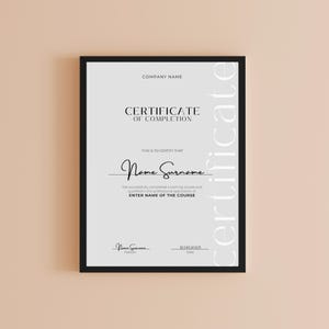 May include: A black and white certificate of completion with the text "COMPANY NAME", "CERTIFICATE OF COMPLETION", "THIS IS TO CERTIFY THAT", "Name Surname", "has successfully completed a training course and qualified in the professional application of ENTER NAME OF THE COURSE", "Nome Surname", "Position", "20/01/2023", "Date", and "Certificate" printed on it.