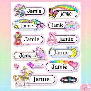 May include: A sheet of personalized name labels with various designs, including a roller skate, rainbow, butterfly, swan, gumball machine, teddy bear, cat, moon, hearts, and carousel. Each label has the name "Jamie" printed on it.
