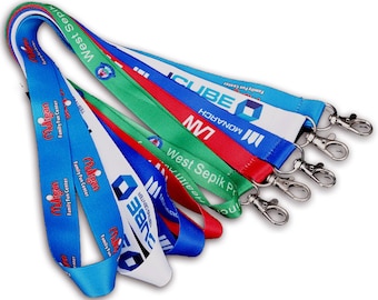 May include: A collection of colorful lanyards with various logos and text, including "Muligan Family Fun Center", "CUBE", and "West Sepik Pr". Each lanyard has a metal clasp. The lanyards are blue, red, green, and white.