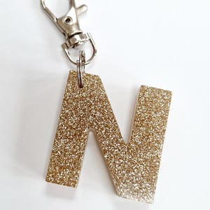 Glitter resin initial keyring/bag charm. Sparkly personalised letter keyring. Gifts, party bag fillers, favours. Resin letters handmade Gold glitter