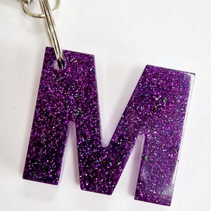 Glitter resin initial keyring/bag charm. Sparkly personalised letter keyring. Gifts, party bag fillers, favours. Resin letters handmade Purple glitter