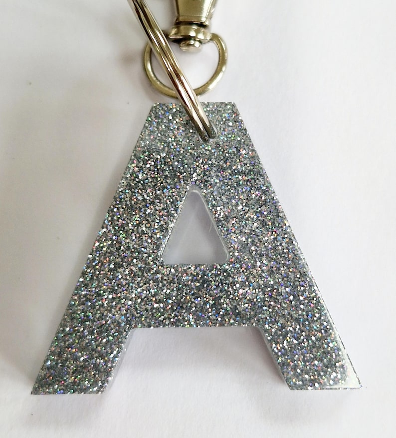 Glitter resin initial keyring/bag charm. Sparkly personalised letter keyring. Gifts, party bag fillers, favours. Resin letters handmade Silver glitter