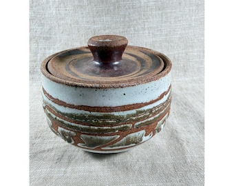 Tarro de cerámica con tapa, estilo vintage, con esmalte marrón verdoso.