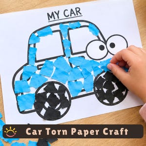 May include: A white paper sheet featuring a black outline drawing of a car with the text MY CAR at the top. The car body is partially filled with torn light blue paper pieces, and the two wheels are filled with torn black paper pieces.