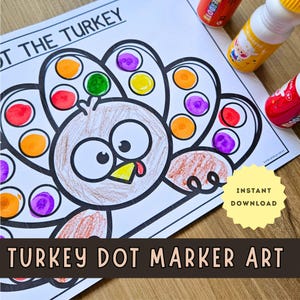 May include: A white paper sheet featuring a black outline drawing of a turkey with circular spaces for dot markers, partially filled with orange, green, yellow, purple, and red ink. Three colorful dot marker bottles are positioned nearby.