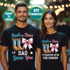 May include: Two black t-shirts featuring a graphic with the text Boots or Bows, a pair of brown cowboy boots, a pink bow, and small footprints. The left shirt says DAD LOVES YOU, and the right shirt says KEEPER OF THE GENDER. Two circular labels read READY TO PRESS and DTF TRANSFER.