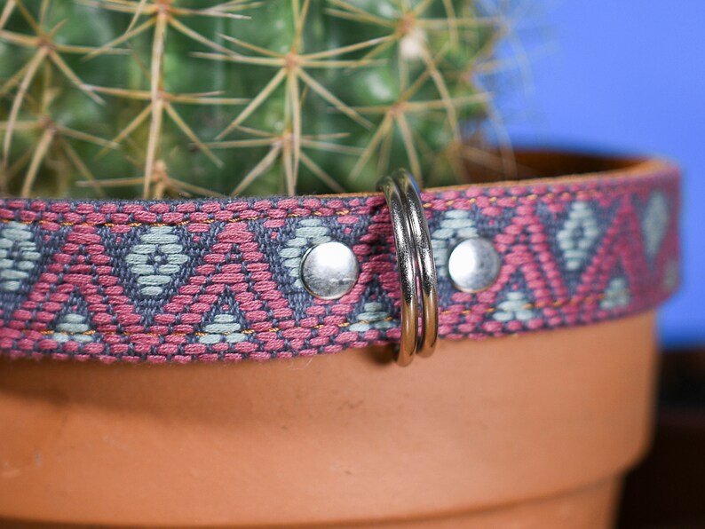 Artisanal leather dog collar handcrafted by Mexican artisans using Aztec techniques. This Western dog collar features genuine leather, intricate embroidery, stainless steel D-rings, and inner padding. Perfect for small, medium, and large dogs.