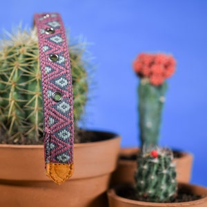 Artisanal leather dog collar handcrafted by Mexican artisans using Aztec techniques. This Western dog collar features genuine leather, intricate embroidery, stainless steel D-rings, and inner padding. Perfect for small, medium, and large dogs.