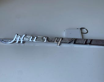 Vintage logo for the first USSR car of the VAZ 2101 family. The so-called kopeck. Chrome plating, metal. Original.