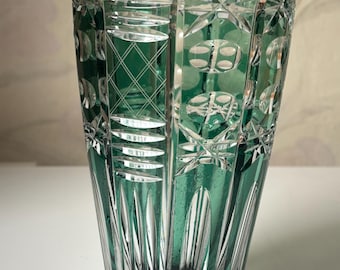 Emerald green vase with carved crystal. Made in Germany.