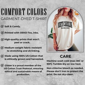 May include: Cream-colored garment-dyed t-shirt with "North Carolina Tar Heel State" printed on the front. The shirt is made of 100% US cotton and is medium-weight. The care instructions are machine wash cold and tumble dry on low heat.