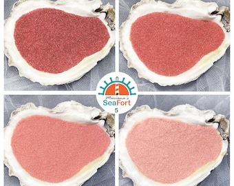 Roze flamingokleurig zand: strandsprankeling voor eenheidsceremonie