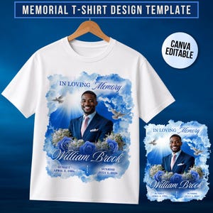 May include: A white t-shirt featuring a memorial design with a portrait of a man in a suit, blue roses, and white doves against a blue cloud background. The text reads IN LOVING MEMORY, William Brook, SUNSET APRIL 3, 1986, and SUNRISE JULY 1, 2026.