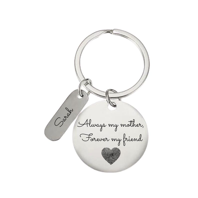 Personalized silver keychain for mom with engraved message “Always my mother, forever my friend,” custom name tag, and fingerprint heart design on a clean white background.