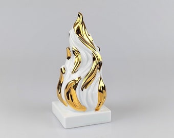 Vintage white gold ceramic flame figure