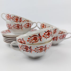 Japanese 1950s Porcelain Tea cup and Saucer Set with a Floral Red & Black Pattern