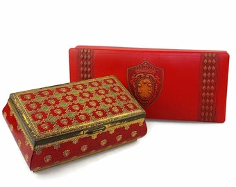 Vintage red embossed tin and faux leather heraldic box