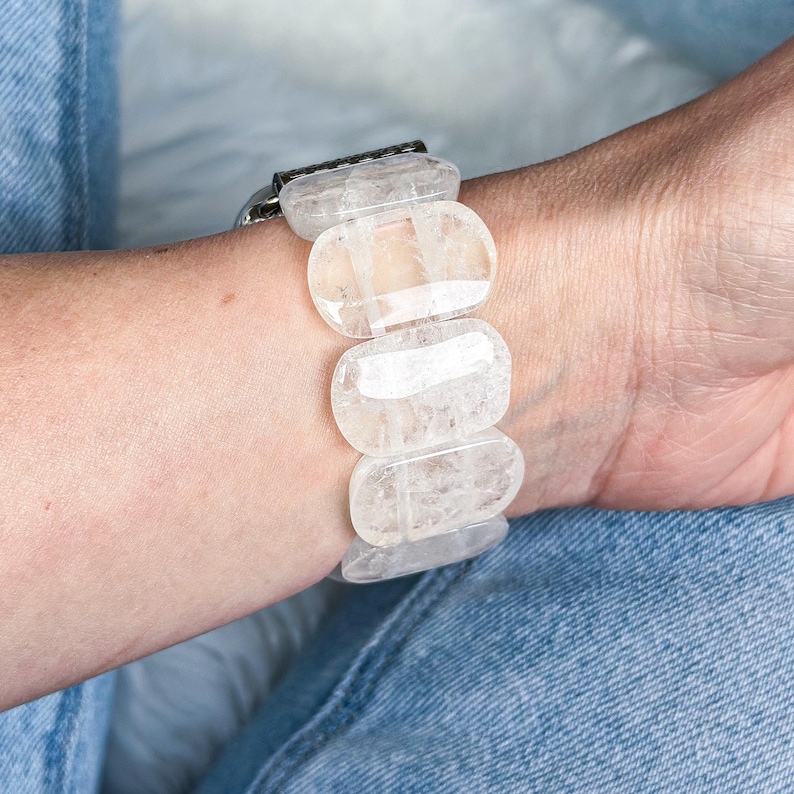 Back view of beaded Apple Watch band on hand, showing smooth white stones and a stretch fit for comfort and style