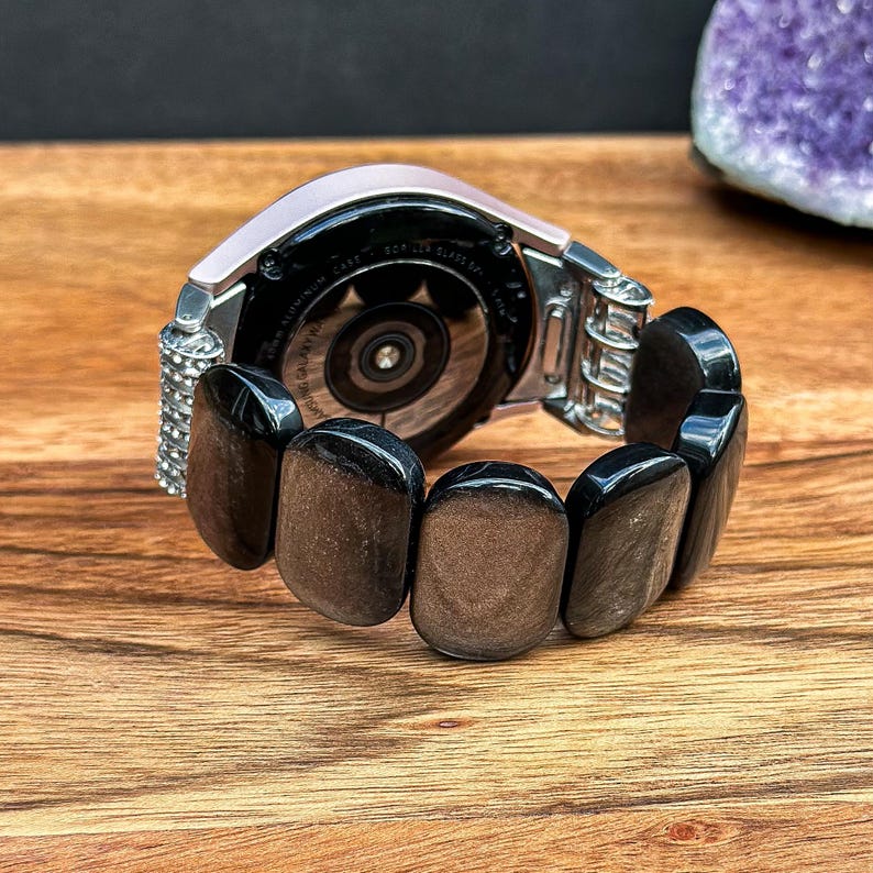 Silver Obsidian Gemstone watch band with a Samsung Galaxy Watch attached, displayed on a neutral background to emphasize the sophisticated style.