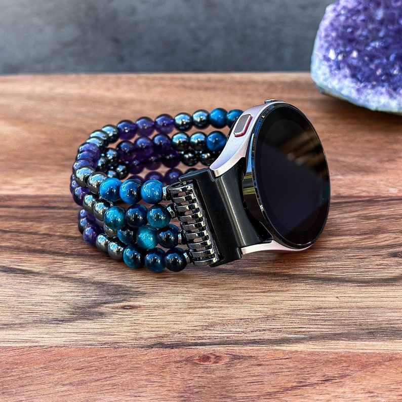 Handcrafted Samsung Galaxy Watch Band showcasing Black Hematite, Purple Amethyst, and Blue Tiger Eye gemstones. Each bead is carefully selected for its captivating natural charm and elegant finish.