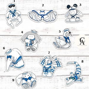 May include: A set of white stickers depicting cartoon characters in sailor attire. The designs include a bear, crab, swan, and alligator, all wearing sailor hats and blue and white striped outfits.