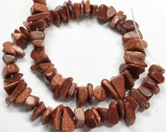GOLDSTONE 8mm tumbled nugget chips beads - 8.5 inch strand