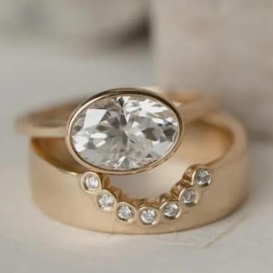 Oval Cut CZ Diamond Bridal Ring Set: Sterling Silver Bezel Setting