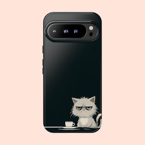 May include: Black phone case with a grumpy cat cartoon illustration and a cup of coffee. The cat is gray and white and has a grumpy expression. The phone case is black and has a camera lens on the back.