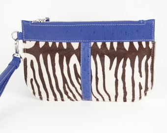 Zebra printed wristlet clutch with blue genuine ostrich leather trim  - metal zipper - blue suede lining- handmade in Canada