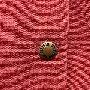 May include: A handmade wooden sign with the text "Welcome to our home" in a handwritten style. The sign is painted white with a distressed finish and a dark brown border. It measures approximately 12 inches wide and 8 inches tall.