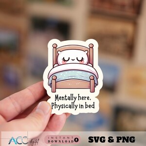 May include: A sticker featuring a cartoon bear in bed with closed eyes. The bed is brown with a blue blanket. Text on the sticker reads "Mentally here. Physically in bed."