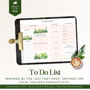 Op de afbeelding: Een digitale To Do List op een tablet, vastgehouden door een gouden clip. De lijst is geïnspireerd op de "Eat That Frog" methode, met secties voor time blocking en wekelijkse overzichten. Bevat bloemenillustraties en de tekst "Ready to Use PDF".