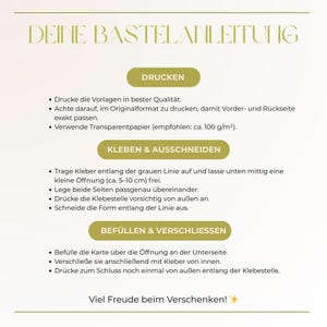 May include: A cream-colored instructional guide with the title "DEINE BASTELANLEITUNG" in gold lettering. The guide provides instructions for printing, gluing, cutting, filling, and sealing. The text is in German.