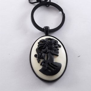 Bohemian Creation Key Chain Lady Skeleton Resin Cameo Center Black Metal Key Chain with Hook Clasp